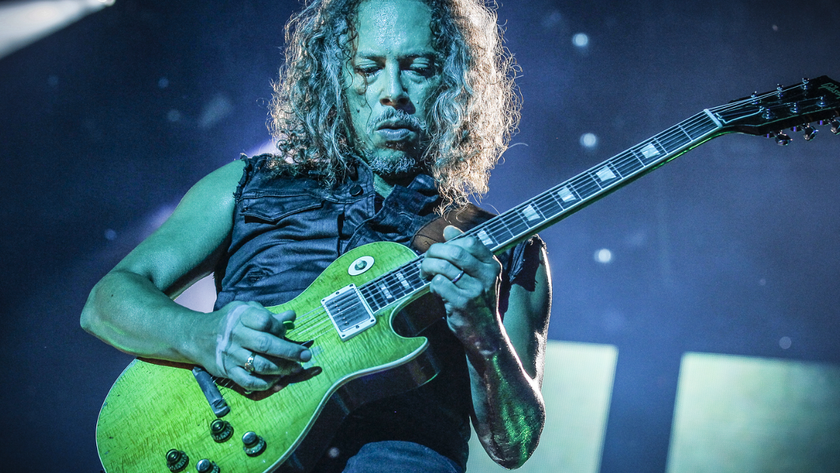 Kirk Hammett performing with Metallica, playing his Les Paul guitar Greeny