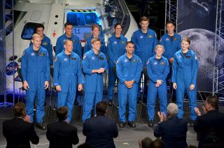 The 12 new members of NASA's 2017 astronaut class are seen during their introduction at the agency's Johnson Space Center in Houston on June 7. Vice President Mike Pence joined other elected and NASA officials in applauding the group.
