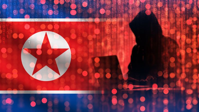 North Korean flag with a hooded hacker