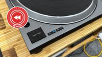 Technics turntable play button with Rewind logo