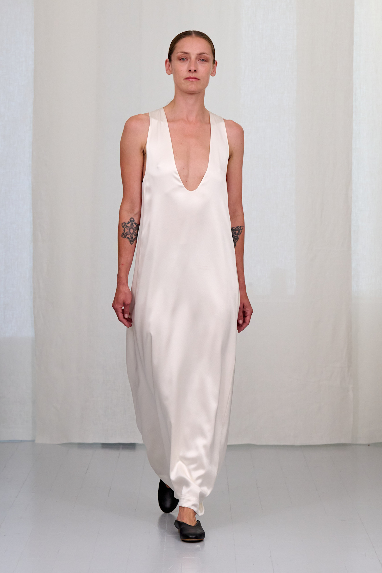 Runway model walking in show at Copenhagen Fashion Week spring/summer 2027.