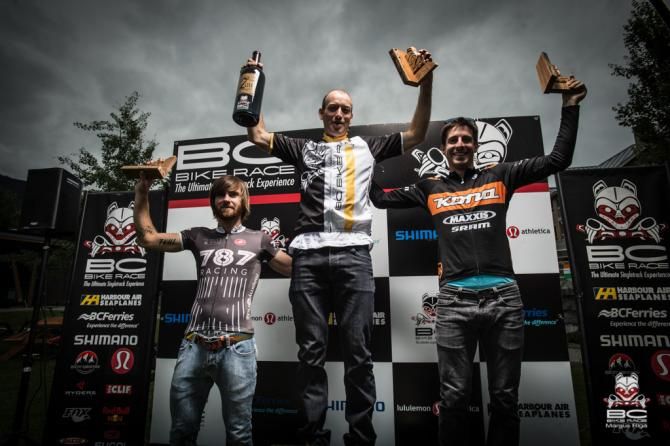 Elite men's podium: moody skies backdrop a solid celebration of worthy proportions!