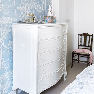 bedroom with white dressing table and