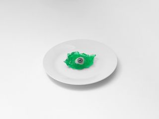 Glass Eye on White Plate, London, 2017, by Brian Griffin