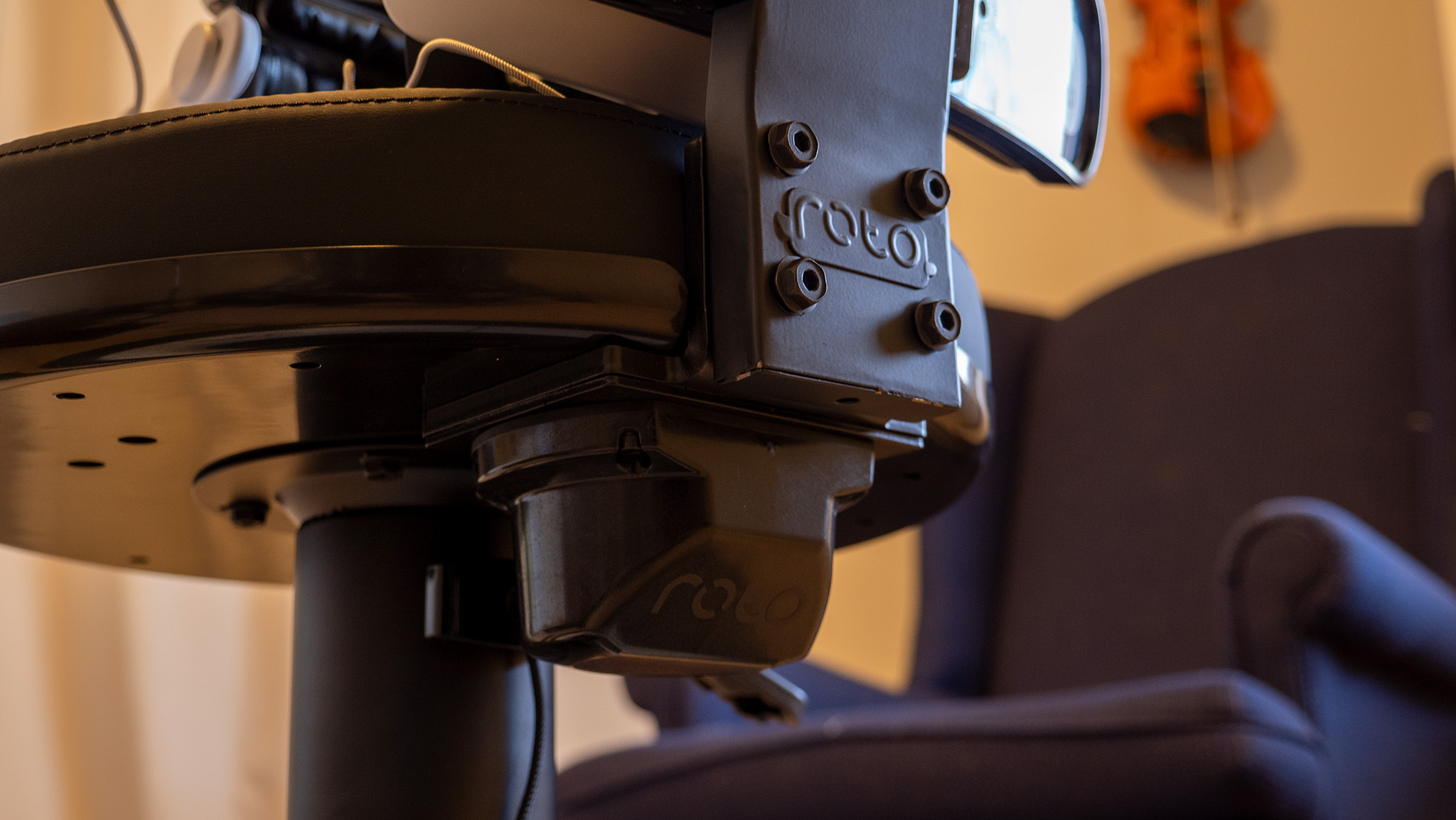 The strong metal back of the Roto VR Explorer chair and the haptic motor underneath