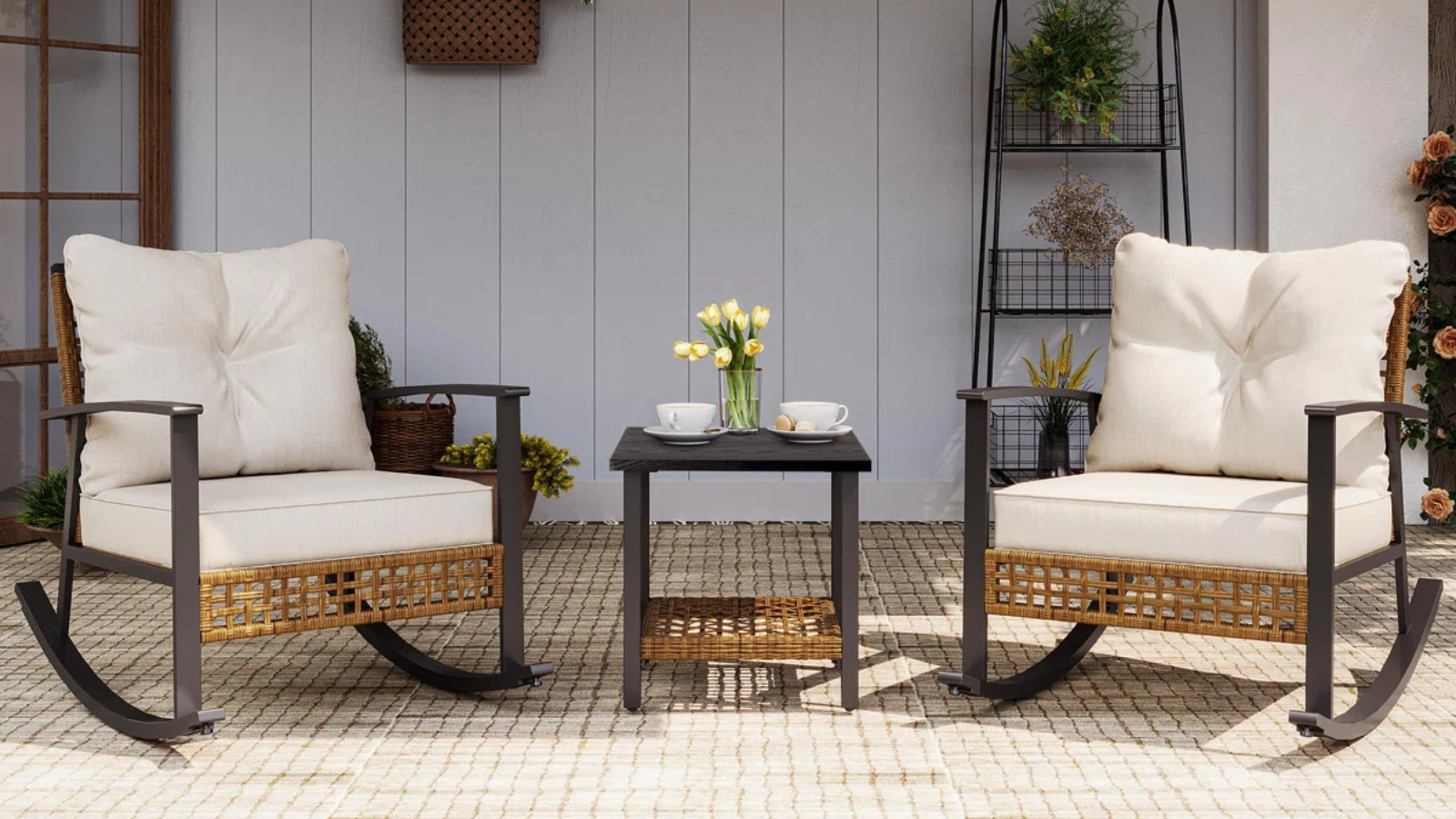 two outdoor rocking chairs and a small side table