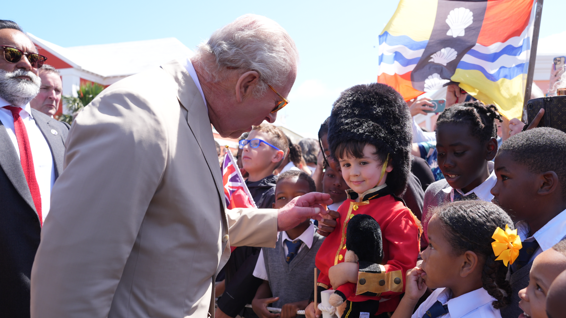 King Charles III speaks to well-wishers during a ceremonial welcome at King's Square on May 1, 2026 in St. George's, Bermuda