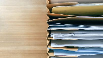 Documents in filing folders.