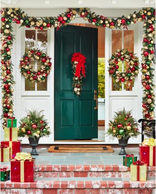 a front door surrounding by ornaments