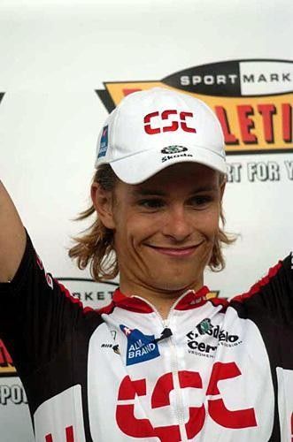 Linus Gerdemann (CSC) grins from the podium