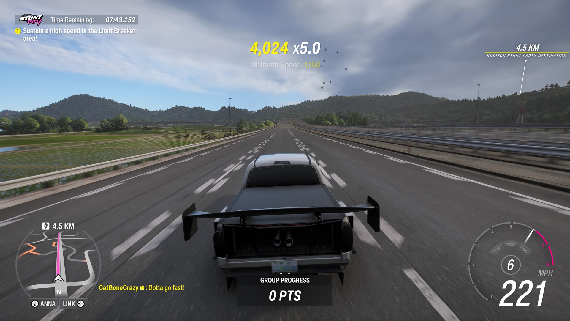 A car blurs down the highway in a drag race in Forza Horizon 6