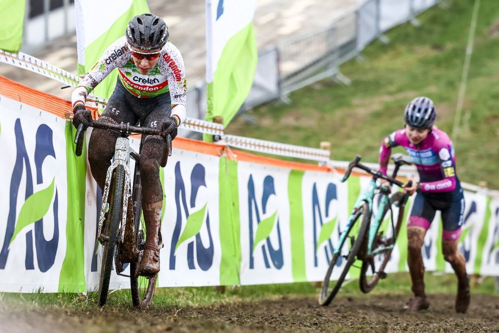Belgian Sanne Cant and Belgian Laura Verdonschot pictured in action during the women's elite and U23 race at the Belgian Championships cyclocross cycling in Meulebeke, on Saturday 13 January 2024. BELGA PHOTO DAVID PINTENS (Photo by DAVID PINTENS / BELGA MAG / Belga via AFP)