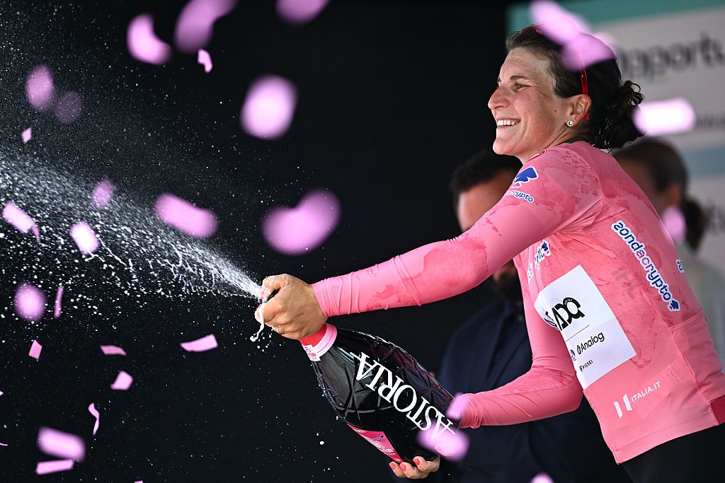 MONTE NERONE, ITALY - JULY 12: Elisa Longo Borghini of Italy and UAE Team ADQ celebrates at podium as Pink Leader Jersey winner during the 36th Giro d'Italia Women 2025, Stage 7 a 150km stage from Fermignano to Monte Nerone 1396m / #UCIWWT / on July 12, 2025 in Monte Nerone, Italy. (Photo by Luc Claessen/Getty Images)