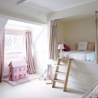 girls bedroom with pink wall and curtains on window