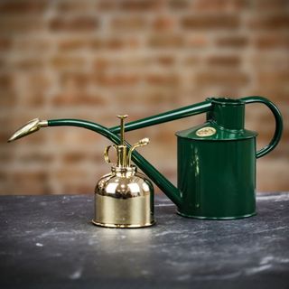 A Haws Green & Brass Watering Set 