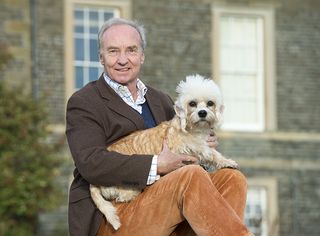 Richard Scott, the 10th Duke of Buccleuch pictured with Bowhill’s resident Dandie Dimmont, Lucy at Bowhill House near Selkirk, Scotland. (Picture: ©Country Life/Ian Rutherford)