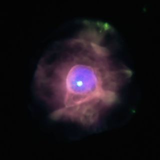 The planetary nebula IC 4593 shines like a brilliant purple amethyst in space in this view from NASA's Chandra X-ray Observatory.