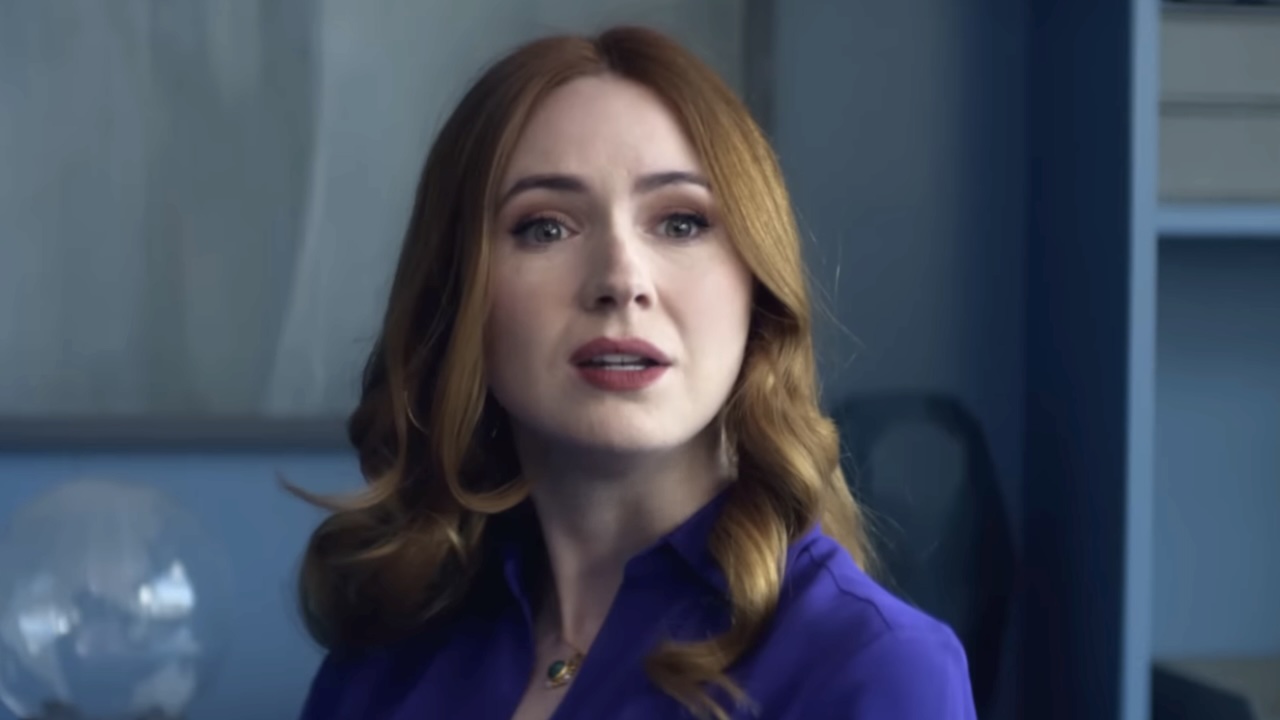 Close-up of Madeline wearing a purple jacket in Douglas Is Cancelled
