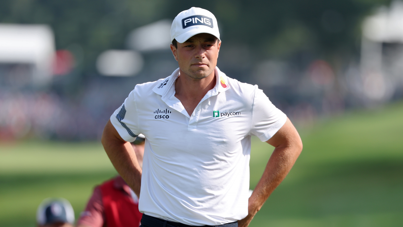 Viktor Hovland walks off the tee