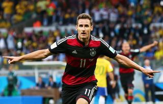 Miroslav Klose celebrates after scoring for Germany against Brazil at the 2014 World Cup.