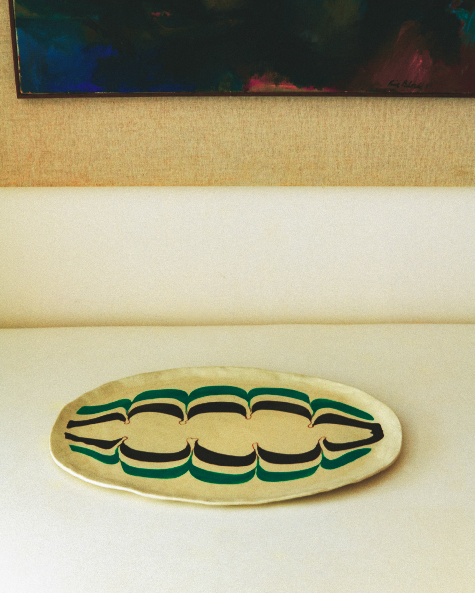 hand painted serving platter on white table