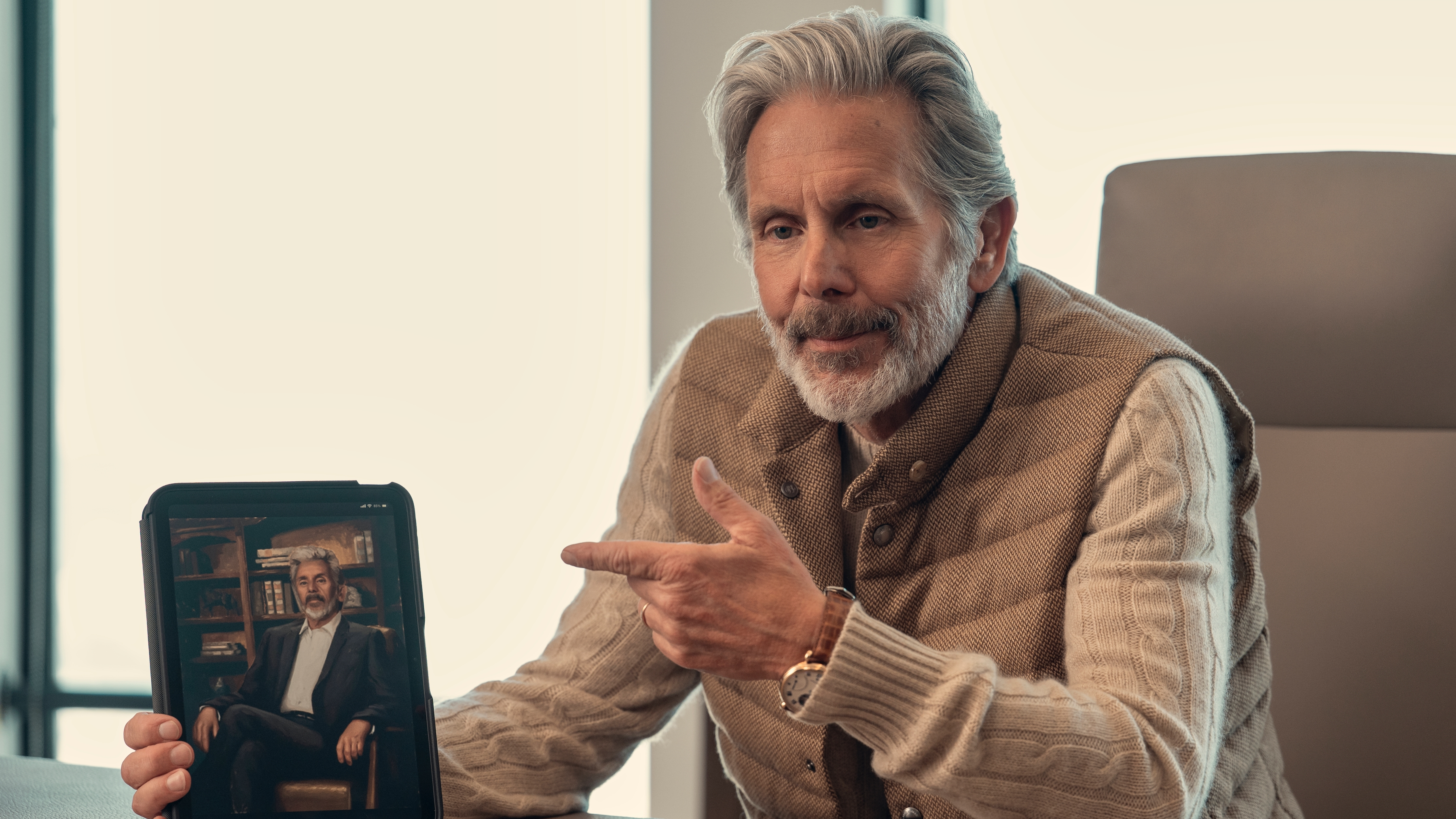 Brad Vinick (Gary Cole) sits at a desk in a scene from "A Man on the Inside" season 2