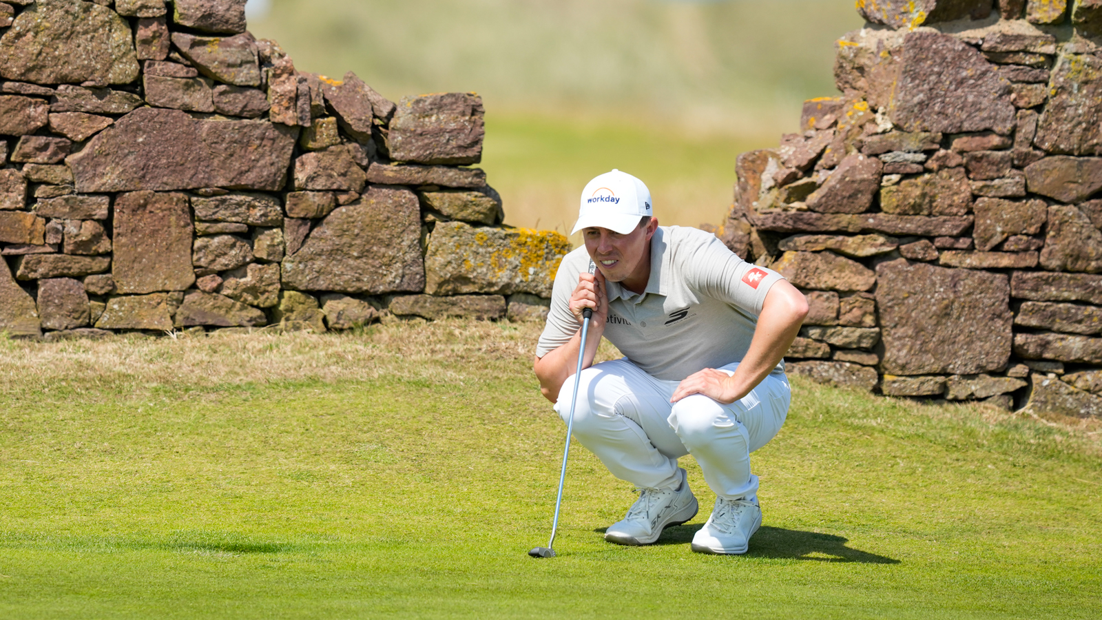 Matt Fitzpatrick lines up a putt