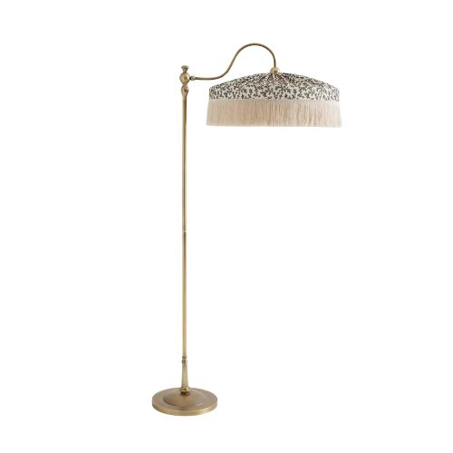 Gold floor lamp with tasselled shade