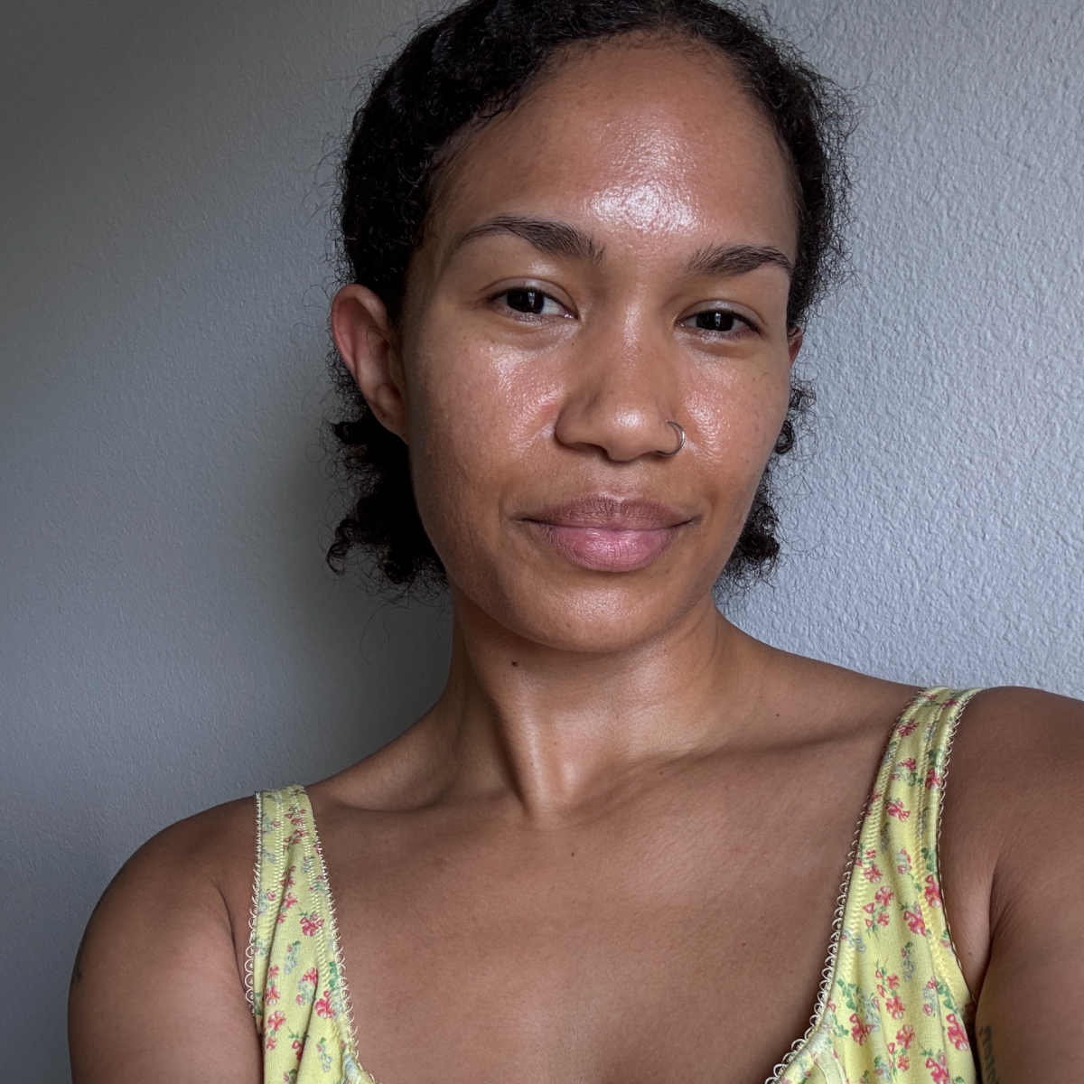 A beauty editor wearing Anua's Collagen PDRN Melting Patch