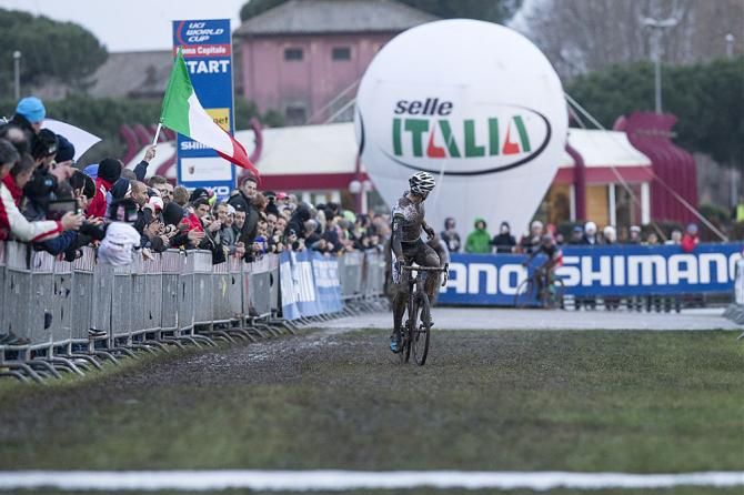 Niels Albert looks back to check his advantage.