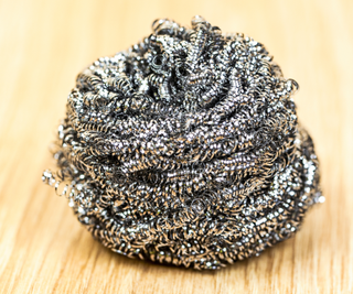 Steel wool scourer