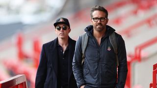 Welcome to Wrexham season 3 stars and Wrexham AFC co-owners Rob McElhenney and Ryan Reynolds at the Racecourse Ground in April 2023