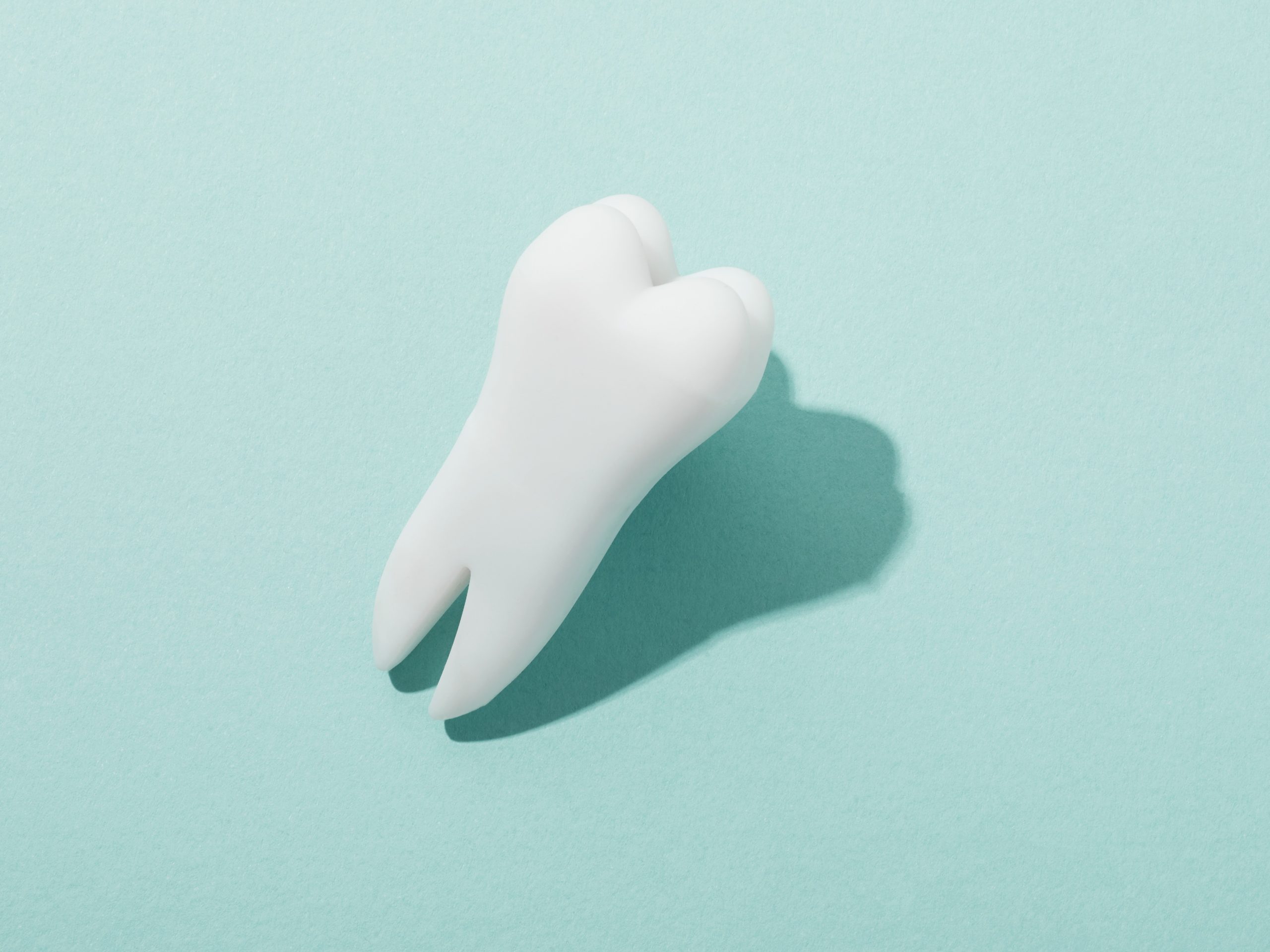 tooth on blue background