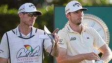 Travis Perkins consults with Sam Burns at the 2022 Arnold Palmer Invitational