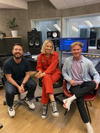 Martin Compston and Phil MacHugh sit at the control desk in a recording studio with Norwegian pop star Dagny sitting between them
