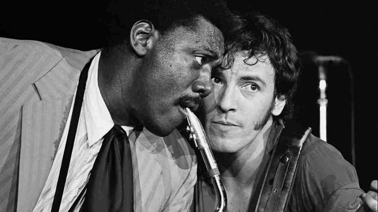 Bruce Springsteen and Clarence Clemons performing onstage in the early 1980s