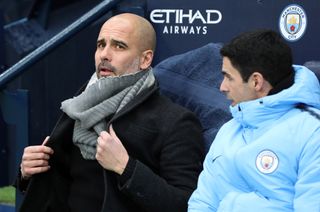 Mikel Arteta, right, and Pep Guardiola at Manchester City