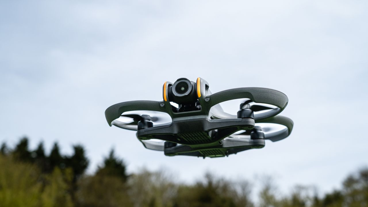 DJI Avata 2 in flight against a cloudy sky
