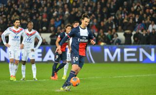 Zlatan Ibrahimovic scores a Panenka penalty for Paris Saint-Germain against Lyon in December 2013.