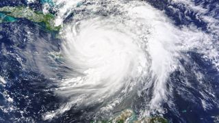 Hurricane Matthew makes landfall in Haiti in 2016. An upcoming La Niña weather pattern could result in powerful Atlantic hurricanes like this one.