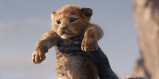 simba being held high on Pride Rock in The Lion King