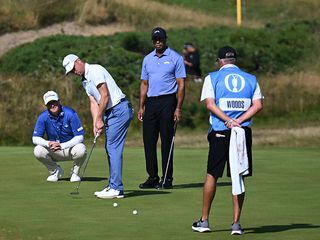 Tiger Woods and Justin Thomas practicing putting before the Open Championship