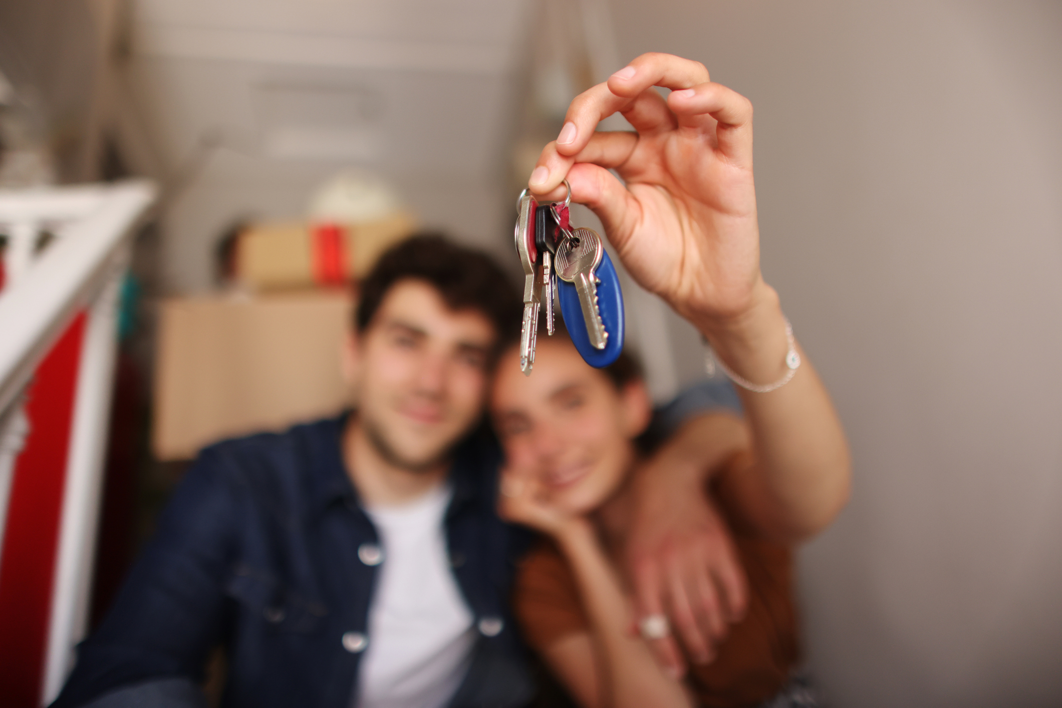 couple holding house keys