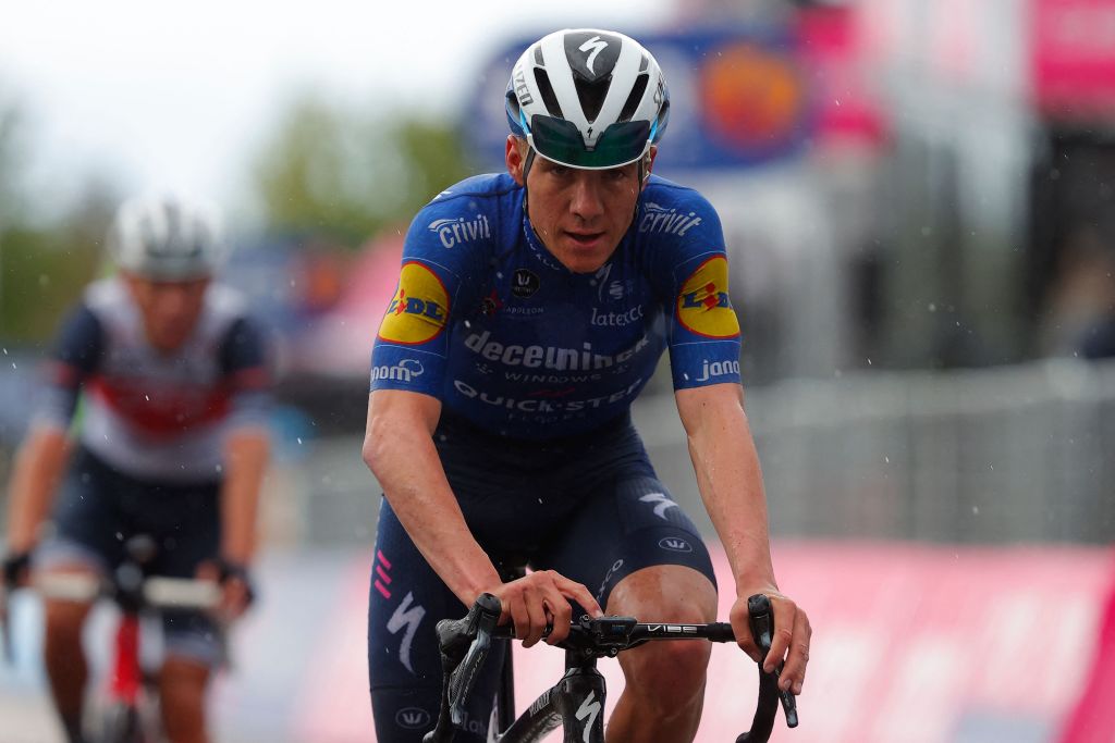 Team Deceuninck rider Belgiums Remco Evenepoel crosses the finish line of the sixth stage of the Giro dItalia 2021 cycling race 160 km between Grotte di Frasassi and Ascoli Piceno San Giacomo on May 13 2021 Photo by Luca Bettini AFP Photo by LUCA BETTINIAFP via Getty Images