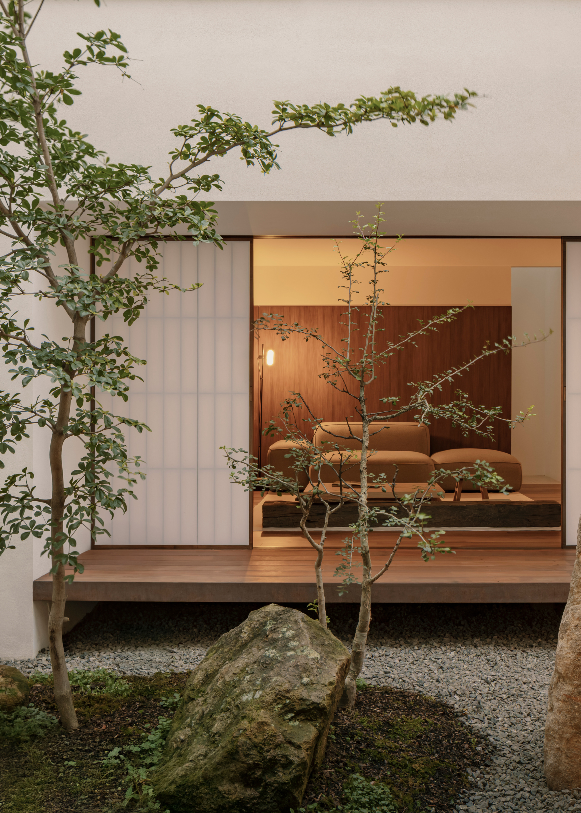 A living nook beside an outdoor garden space
