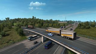 Euro Truck Simulator 2 screenshot showing a busy highway, with trucks driving over a raised road