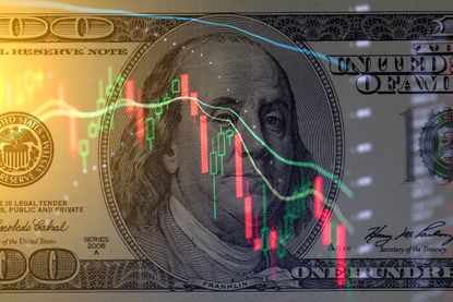 One hundred dollar bill on the background of stock charts.