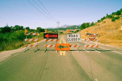 Road with detour signs seen on a road trip