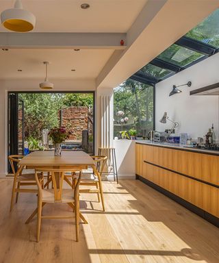 glass side extension with wood kitchen