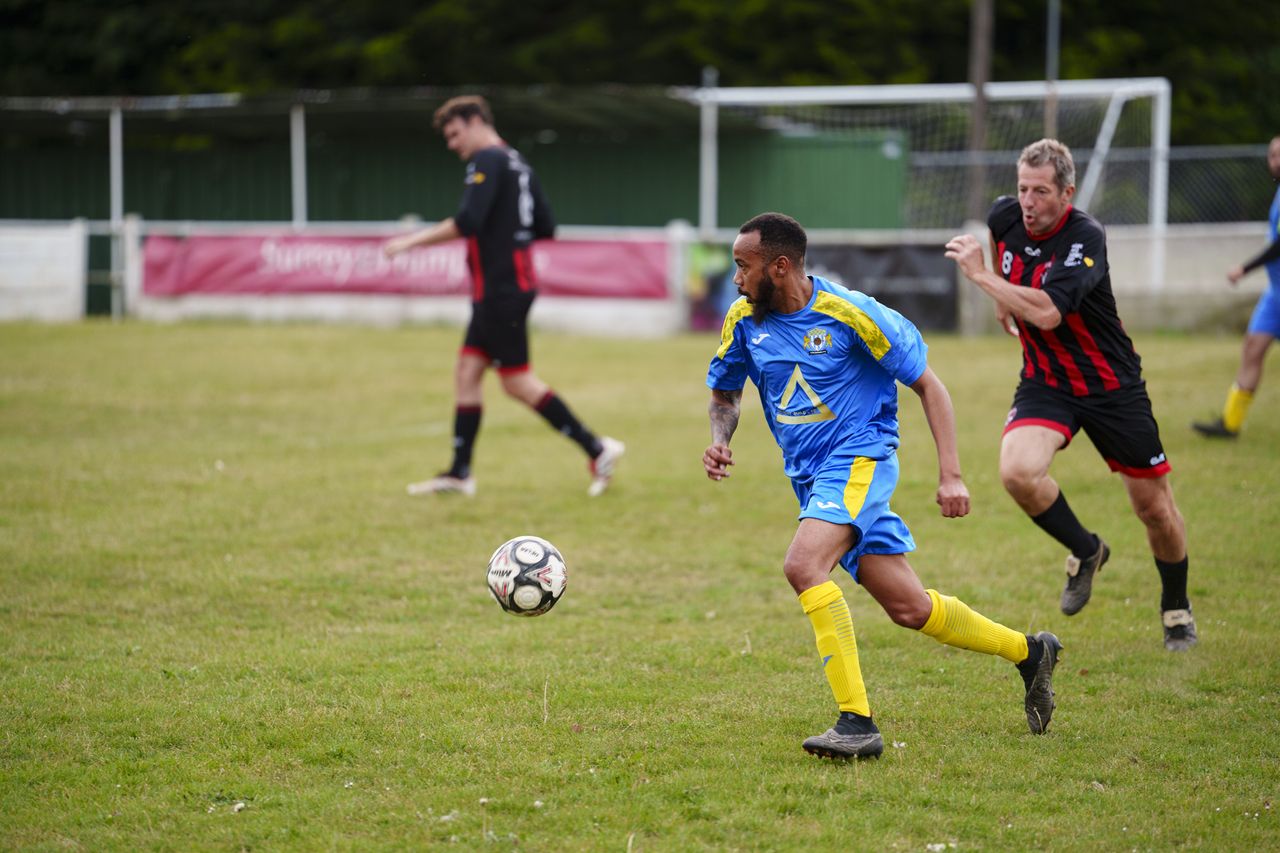 Soccer players in action, taken with the Sony FE 50-150mm F2 GM lens